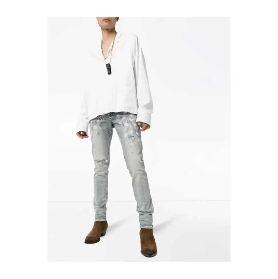 Białe pomalowane jeansy slim fit