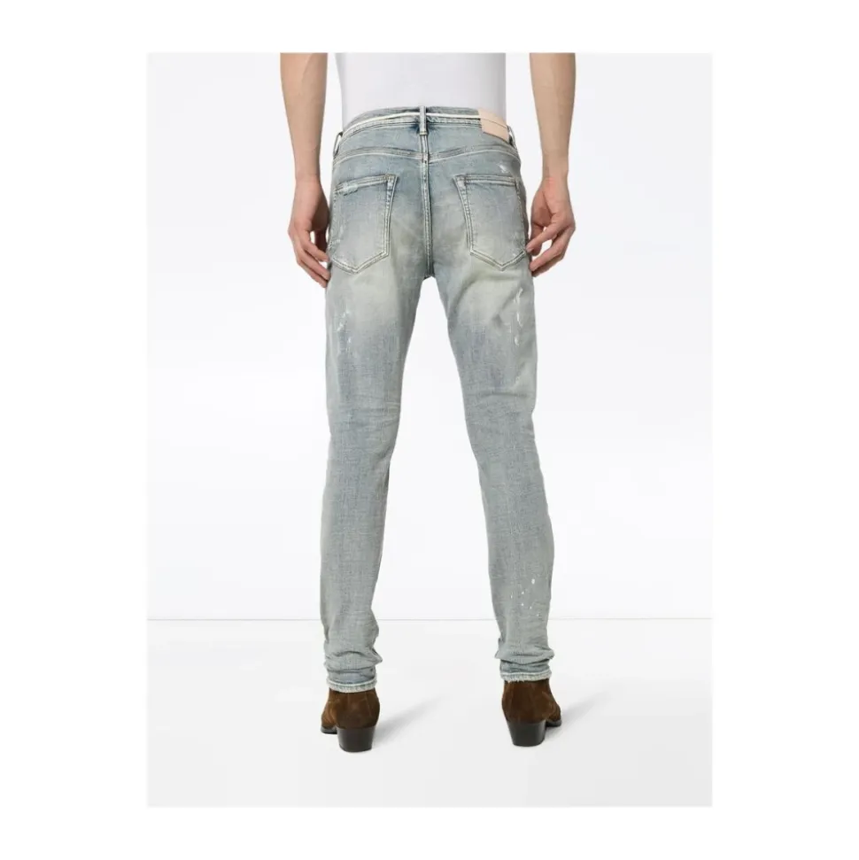 Białe pomalowane jeansy slim fit