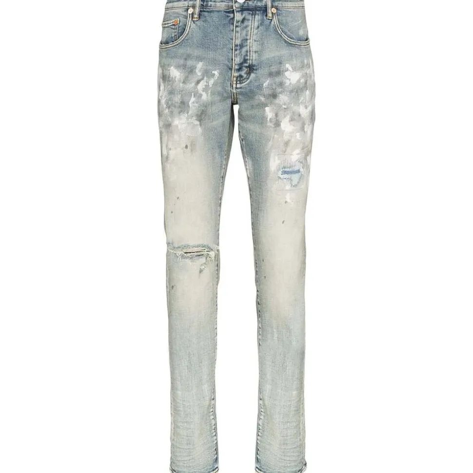 Białe pomalowane jeansy slim fit