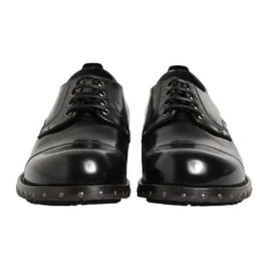 Skórzane, zdobione ćwiekami, eleganckie buty Derby